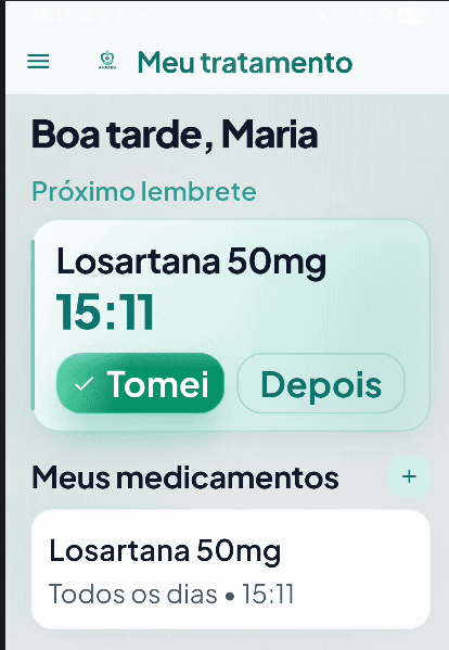 Tela do app Amparo — Meu tratamento, com lembrete de medicamento e confirmação Tomei